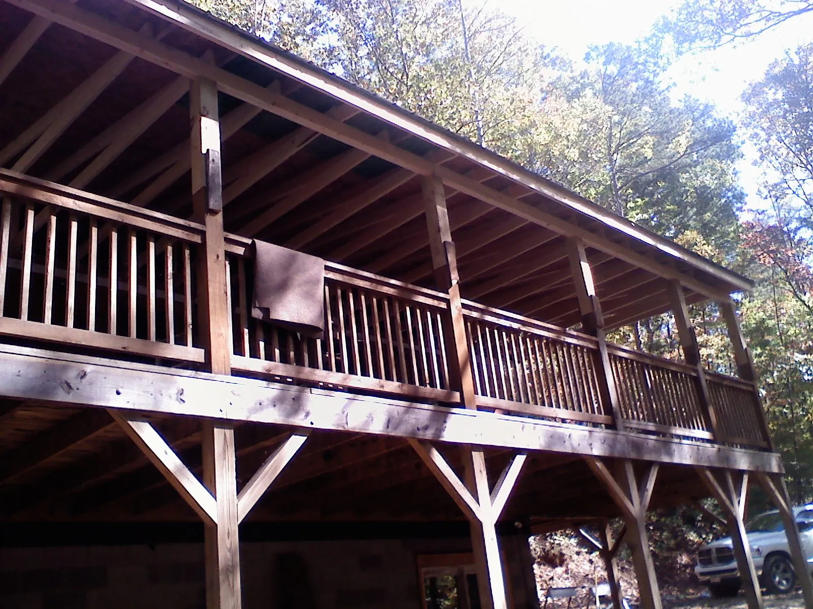 Timber framing under a new elevated porch and deck — Roof Leak Repair in Chenango Forks by Roofing Brothers